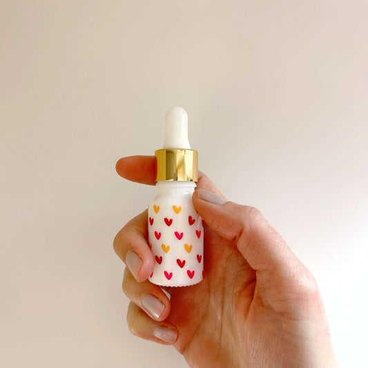 flacon vide d'huile essentielle motif coeurs